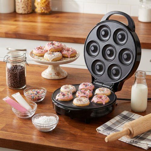 Donutu cepšanas ierīce, 7 mini donuti, diametrs 5 cm, nelīpošas cepšanas plāksnes, rokturis, kas paliek auksts, indikatorgaismas,